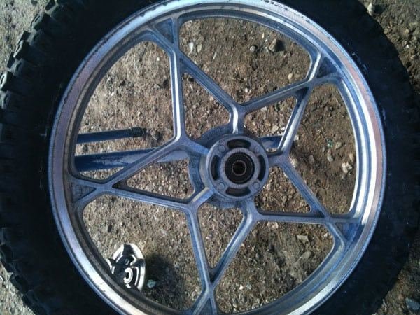 Mag Wheel before blasting — Soda Tec job photo