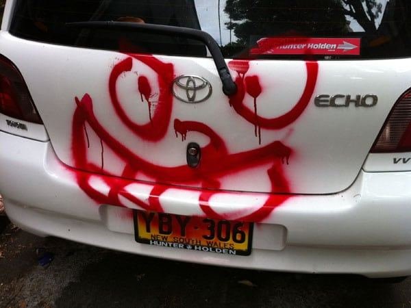 Graffiti on a Vehicle before blasting